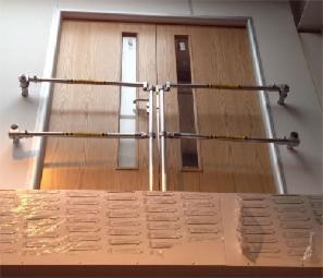 Pallet gate for inward opening doorway Pallet gate for inward opening doorway